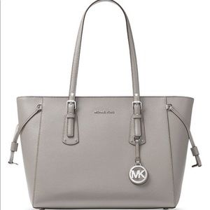 Michael Kors Multifunction Top Zip Voyager